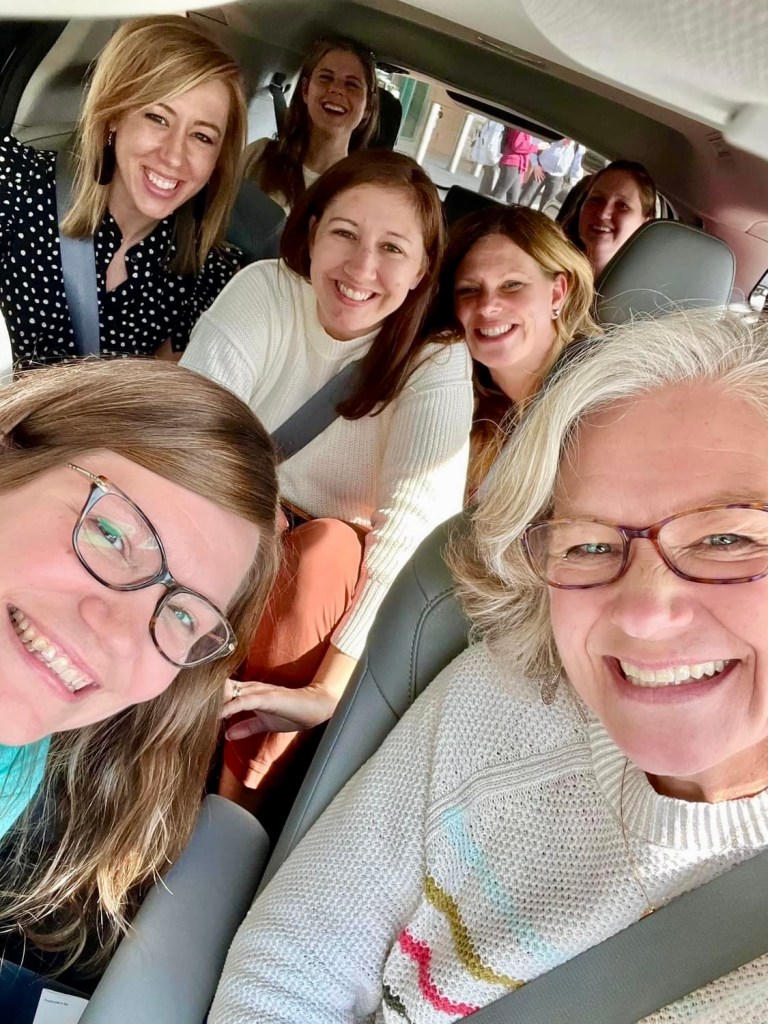 The Daughter First team in a van